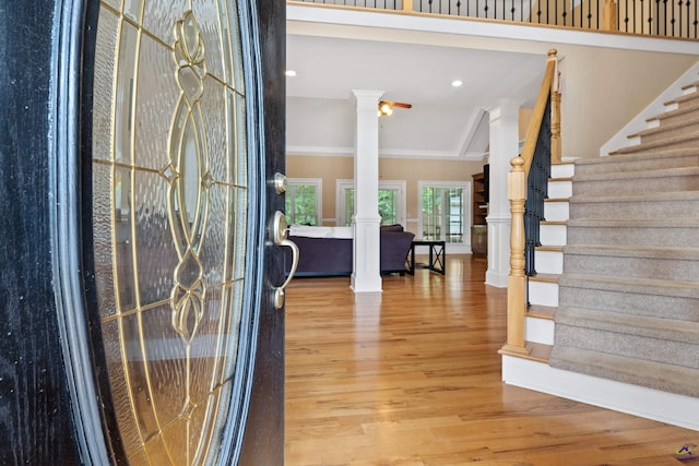 513 Litchfield, Macon, GA 31220 - entryway featuring decorative columns, wood finished floors, stairs, and ornamental molding