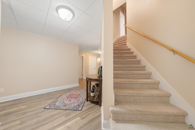 513 Litchfield, Macon, GA 31220 - staircase featuring wood finished floors and a drop ceiling