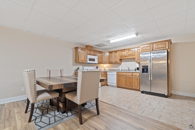 513 Litchfield, Macon, GA 31220 - dining area featuring a paneled ceiling and light wood finished floors
