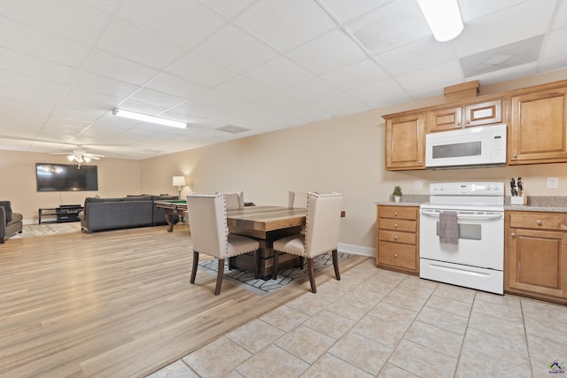 513 Litchfield, Macon, GA 31220 - kitchen featuring white appliances, a drop ceiling, light countertops, open floor plan, and ceiling fan