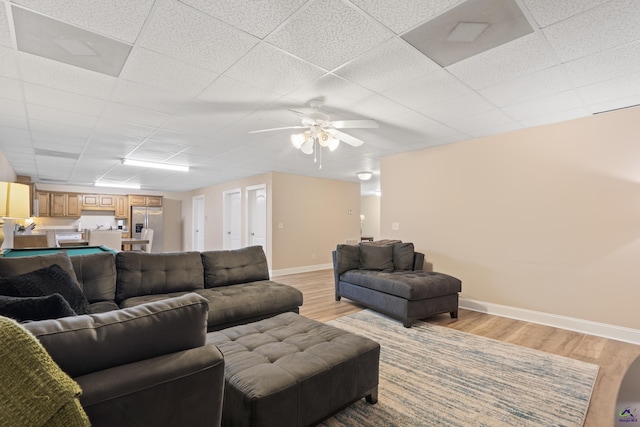 513 Litchfield, Macon, GA 31220 - living room with light wood-style flooring, a ceiling fan, and a drop ceiling