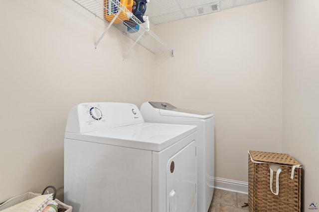 513 Litchfield, Macon, GA 31220 - laundry area with independent washer and dryer and light tile patterned flooring