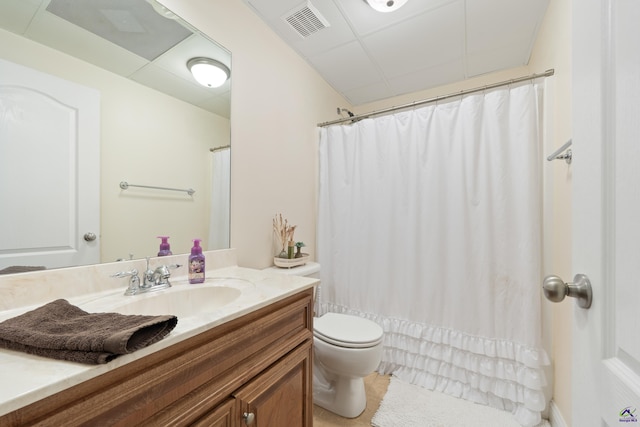 513 Litchfield, Macon, GA 31220 - full bath featuring a paneled ceiling, vanity, and a shower with shower curtain