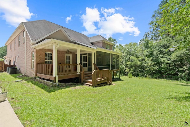 513 Litchfield, Macon, GA 31220 - back of house featuring ceiling fan, a sunroom, a shingled roof, a deck, and brick siding