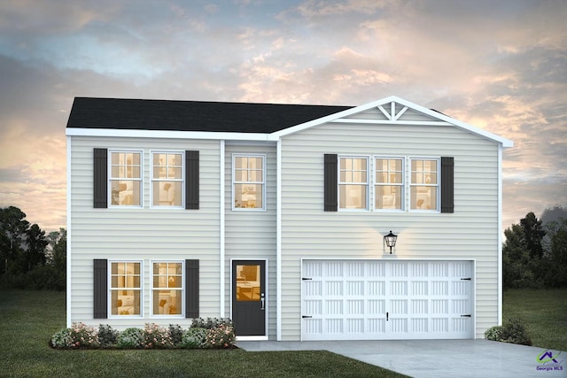 312 Cody Dr, Macon, GA 31216 - view of front of home with an attached garage and driveway