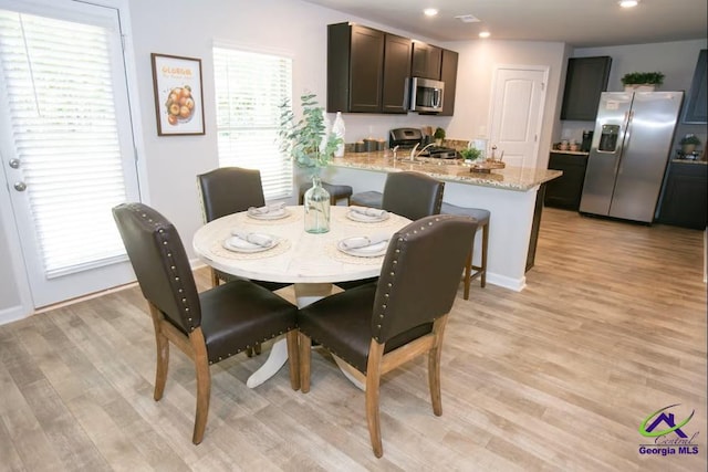 312 Cody Dr, Macon, GA 31216 - dining area featuring light wood-style floors and recessed lighting