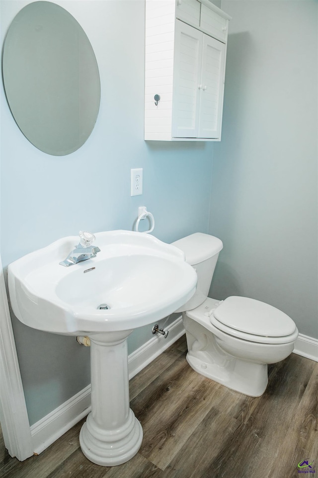 121 Spring Chase Cir, Kathleen, GA 31047 - half bath with wood finished floors and toilet