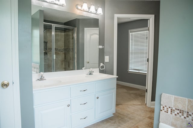 121 Spring Chase Cir, Kathleen, GA 31047 - full bathroom featuring a stall shower and double vanity