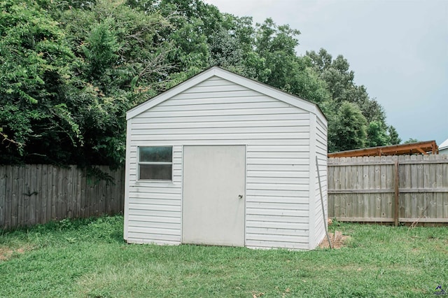 121 Spring Chase Cir, Kathleen, GA 31047 - view of shed with a fenced backyard
