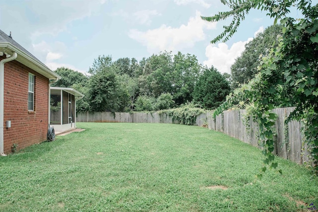 121 Spring Chase Cir, Kathleen, GA 31047 - fenced backyard with a sunroom