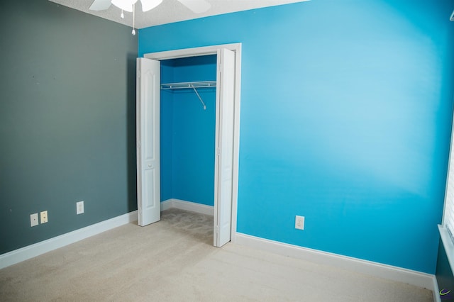 121 Spring Chase Cir, Kathleen, GA 31047 - unfurnished bedroom featuring carpet floors, a closet, and a ceiling fan