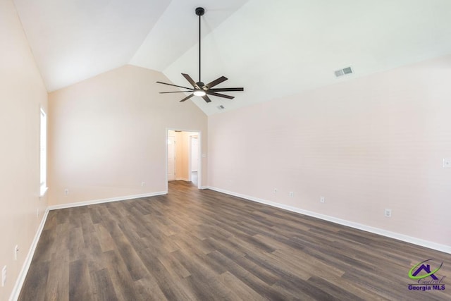313 Strawbridge Ln, Bonaire, GA 31005 - spare room featuring a ceiling fan, dark wood-type flooring, and high vaulted ceiling