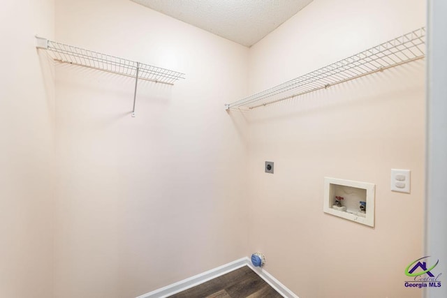 313 Strawbridge Ln, Bonaire, GA 31005 - laundry room with hookup for an electric dryer, dark wood-type flooring, and washer hookup