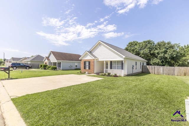 313 Strawbridge Ln, Bonaire, GA 31005 - ranch-style home with a porch