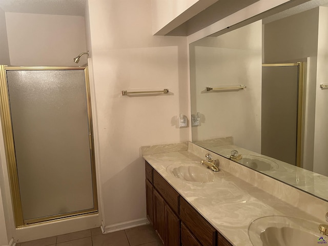 318 Pheasant Rdg, Warner Robins, GA 31088 - bathroom with a stall shower, double vanity, and tile patterned floors