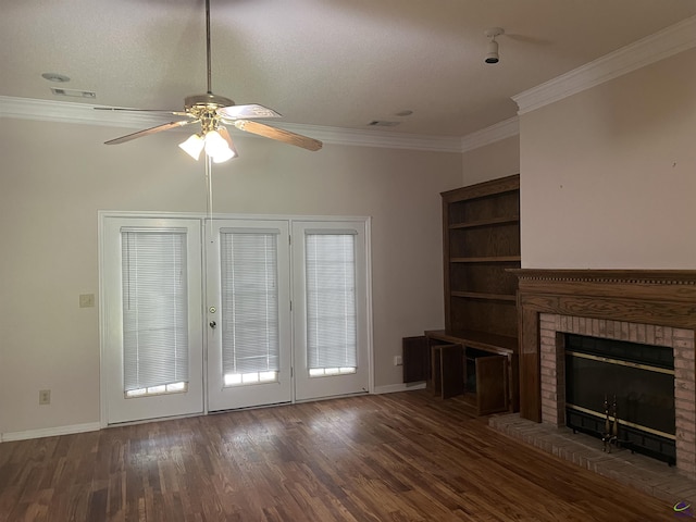 318 Pheasant Rdg, Warner Robins, GA 31088 - unfurnished living room with a ceiling fan, crown molding, wood finished floors, and a brick fireplace