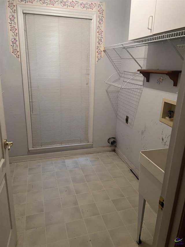 318 Pheasant Rdg, Warner Robins, GA 31088 - washroom featuring cabinet space, washer hookup, and electric dryer hookup