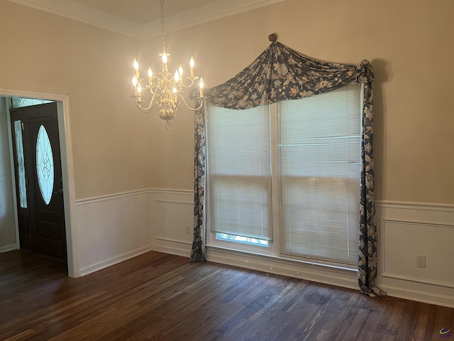 318 Pheasant Rdg, Warner Robins, GA 31088 - unfurnished dining area featuring a chandelier, ornamental molding, wood finished floors, and wainscoting
