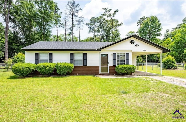 1714 Jean Ave, Albany, GA 31705 - ranch-style house with driveway and a carport