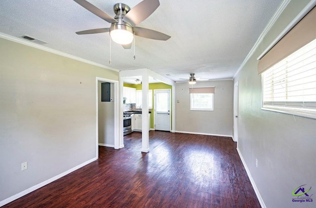 1714 Jean Ave, Albany, GA 31705 - unfurnished living room featuring a ceiling fan, dark wood-style floors, ornamental molding, and a textured ceiling