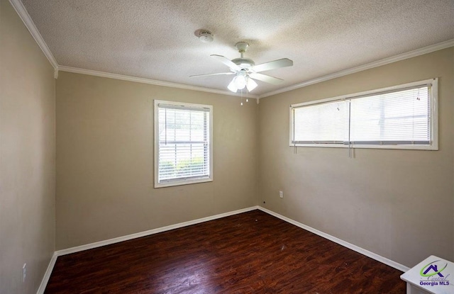 1714 Jean Ave, Albany, GA 31705 - spare room with a textured ceiling, wood finished floors, a ceiling fan, ornamental molding, and a smoke detector