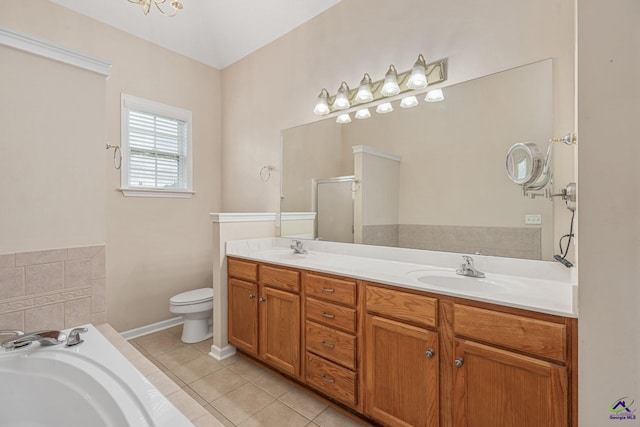 112 Finegand Pl, Warner Robins, GA 31088 - full bath with a shower stall, a garden tub, tile patterned floors, and double vanity