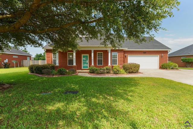 112 Finegand Pl, Warner Robins, GA 31088 - view of front facade with driveway, brick siding, and a garage