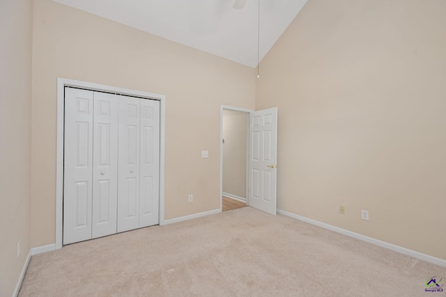 112 Finegand Pl, Warner Robins, GA 31088 - unfurnished bedroom with carpet flooring, high vaulted ceiling, a closet, and ceiling fan