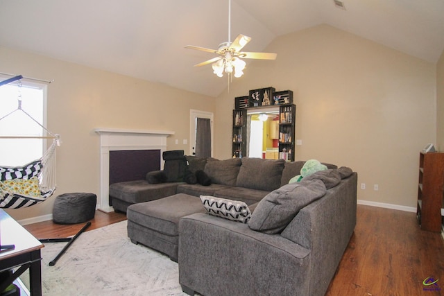 306 Bryson Way, Warner Robins, GA 31088 - living room featuring vaulted ceiling, wood finished floors, and a ceiling fan