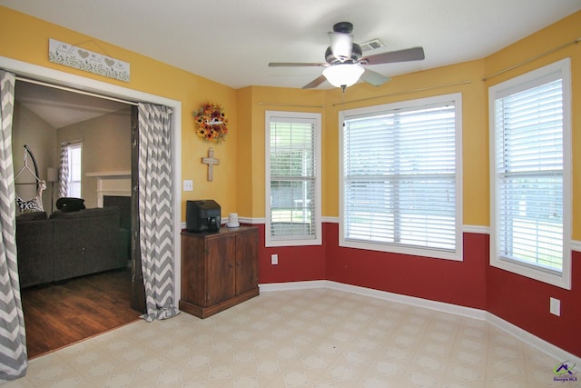 306 Bryson Way, Warner Robins, GA 31088 - dining space with a ceiling fan, plenty of natural light, and a fireplace