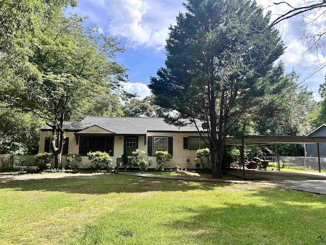 705 Princess Ave, Fort Valley, GA 31030 - ranch-style house with a carport