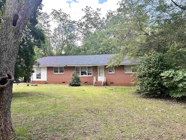 1106 Knoxville St, Fort Valley, GA 31030 - ranch-style home featuring crawl space, entry steps, brick siding, and a front yard