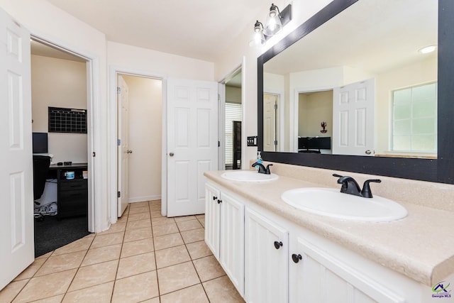 330 Hidden Creek Cir, Warner Robins, GA 31088 - bathroom featuring healthy amount of natural light, double vanity, and tile patterned flooring