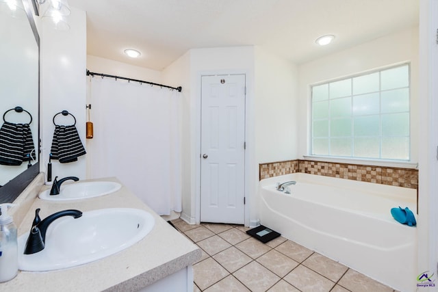 330 Hidden Creek Cir, Warner Robins, GA 31088 - full bathroom featuring tile patterned flooring, double vanity, and a bath