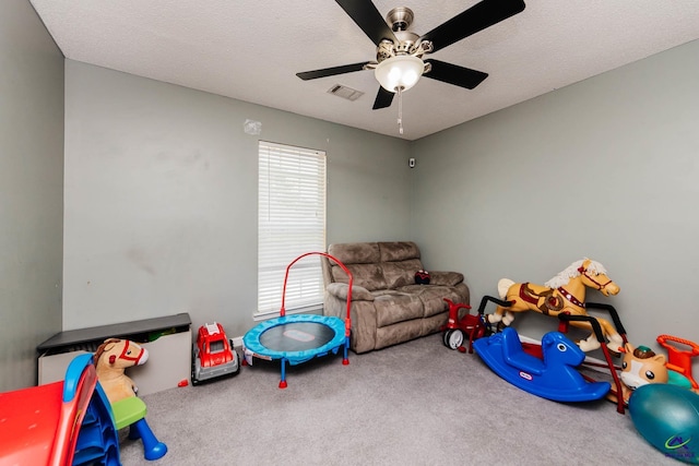 330 Hidden Creek Cir, Warner Robins, GA 31088 - game room featuring a ceiling fan, carpet flooring, plenty of natural light, and a textured ceiling