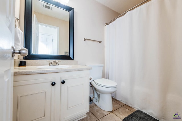 330 Hidden Creek Cir, Warner Robins, GA 31088 - bathroom featuring tile patterned flooring, vanity, and a shower with curtain