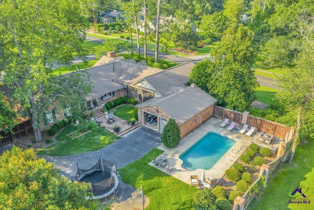 709 Evergreen St, Perry, GA 31069 - aerial view of property and surrounding area with a pool