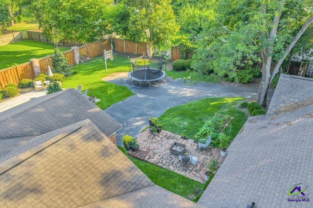 709 Evergreen St, Perry, GA 31069 - view of yard with a trampoline and a patio