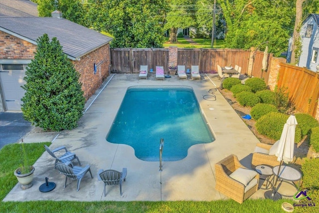 709 Evergreen St, Perry, GA 31069 - view of pool featuring a fenced backyard and a patio