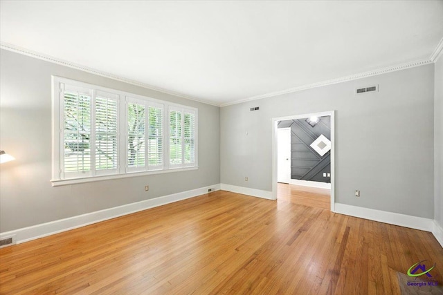 458 Pierce Ave, Macon, GA 31204 - empty room featuring ornamental molding and light wood-style flooring