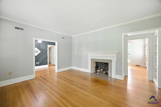 458 Pierce Ave, Macon, GA 31204 - unfurnished living room featuring wood finished floors, ornamental molding, and a fireplace with flush hearth