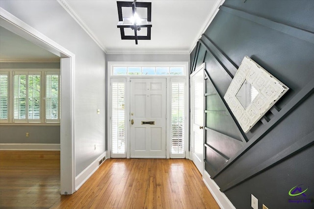 458 Pierce Ave, Macon, GA 31204 - entrance foyer with hardwood / wood-style floors, plenty of natural light, a chandelier, and ornamental molding