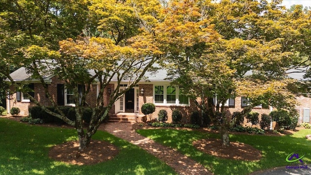 458 Pierce Ave, Macon, GA 31204 - view of front of house featuring a front yard and brick siding
