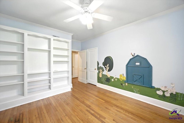 458 Pierce Ave, Macon, GA 31204 - unfurnished bedroom featuring wood finished floors, crown molding, and ceiling fan