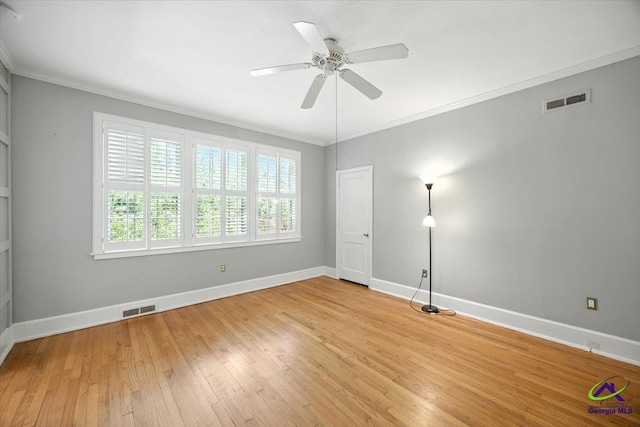 458 Pierce Ave, Macon, GA 31204 - unfurnished room featuring ornamental molding, ceiling fan, and light wood-style floors