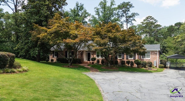 458 Pierce Ave, Macon, GA 31204 - view of front facade with a front lawn and brick siding