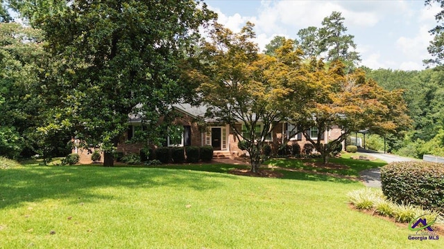 458 Pierce Ave, Macon, GA 31204 - obstructed view of property featuring a front yard