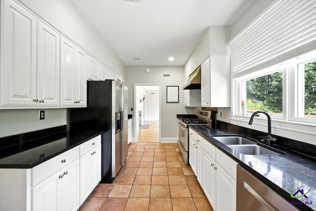 458 Pierce Ave, Macon, GA 31204 - kitchen with appliances with stainless steel finishes, white cabinets, healthy amount of natural light, and recessed lighting