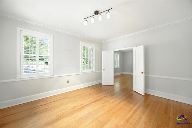 458 Pierce Ave, Macon, GA 31204 - unfurnished room with light wood-type flooring and ornamental molding