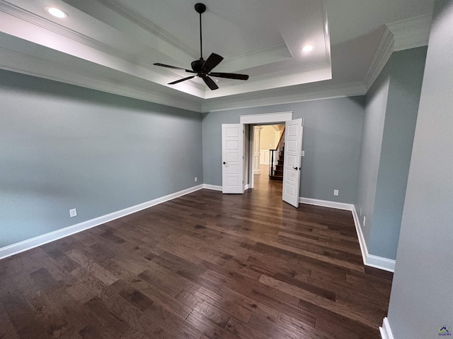 300 Stacy Ln, Warner Robins, GA 31088 - unfurnished bedroom with ornamental molding, dark wood-style floors, a tray ceiling, recessed lighting, and a ceiling fan